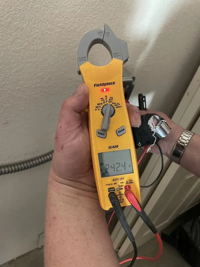 Voltage testing with clamp meter during Electrical Installation Services in Diamond Springs